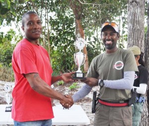 Ryan McKinnon, Limited winner receiving his trophy from GSCF VP, Michael Blake.