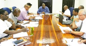 Officials from the Ministry of Public Infrastructure and the Mayor and City Council during the meeting to coordinate activities for the year.