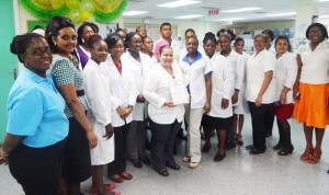 Staff of the GPHC laboratory Unit enjoys a photo op following the simple certification ceremony, yesterday.