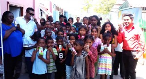 Businessman Frank Sanichara sharing the Juicy Juice joy with children at the Joshua House Children’s home.