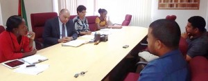 Minister of Natural Resources Raphael Trotman and some members of the Tax Concession Review Committee, during a meeting with two of the miners yesterday.