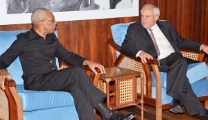 President David Granger and Secretary General of the Union of South American States (UNASUR) Mr Ernesto Samper in discussion during the meeting at the Ministry of the Presidency. 