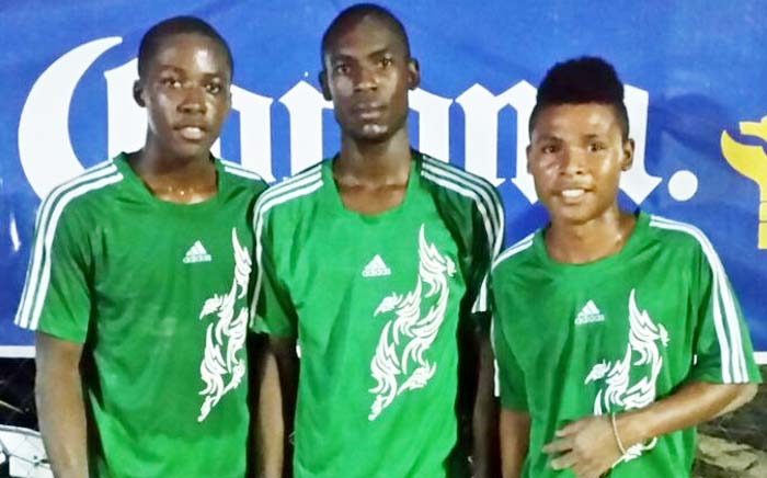 Cordel Johnson (center) flanked by Nigel Bennett (right) and Kevon Walker, KK Warriors goal scorers.