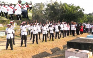 Sergeant Leonard La Rose’s colleagues bear his casket from the Mackenzie Sports Club ground, before giving him a 21-gun salute.