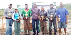 Prize Winners pose with their trophies and Director of Sport Mr. Christopher Jones (centre).