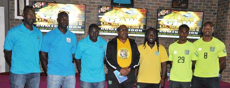 Ready to battle! The Anguilla and Guyana Captains and Technical Staff pose for a photo after the press conference.