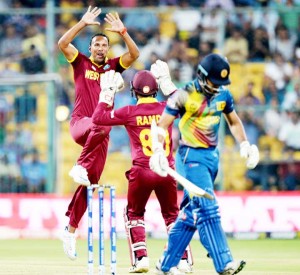 Samuel Badree is jubilant after taking a wicket, Sri Lanka v West Indies, World T20 2016, Group 1, Bangalore, March 20, 2016 ©AFP