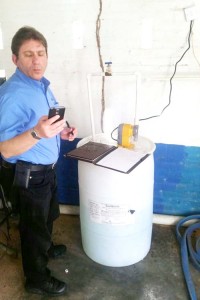 An official working on one of the pilot projects to reduce the iron content in GWI’s water. 