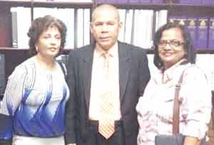 President of the Three Rivers Foundation, Jeanette Singh, Minister of Public Health George Norton and Manager of the organization’s local office Lita Gayadin at a meeting last month 