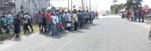 Scores of sugar workers during a protest.