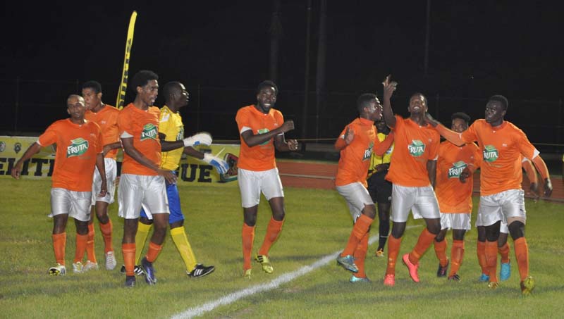 Fruta Conquerors players celebrating Hubert Pedro’s goal against Alpha United on Friday night last.