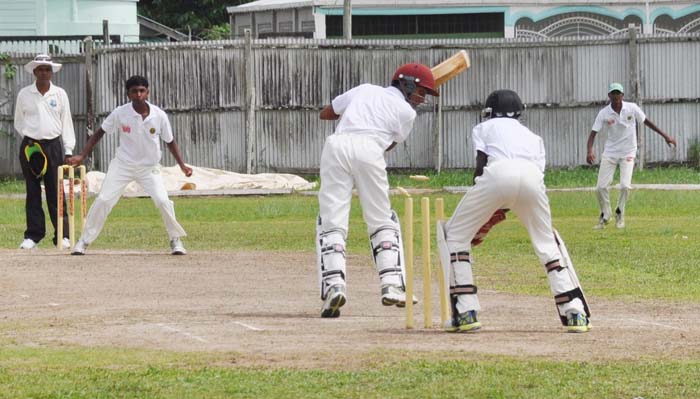 Junior St Clair stumps Marvan Prashad off Kevin Umroa at Wales yesterday on his way to 4-11.