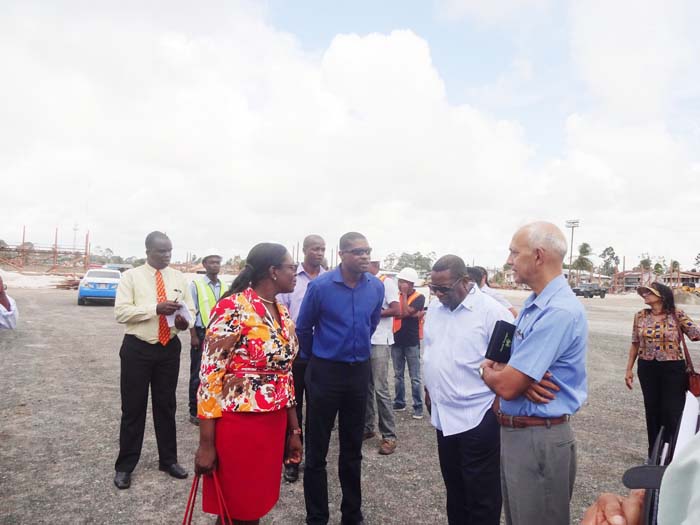 Minister David Patterson meeting with Ministers Nicolette Henry and Ronald Bulkan at the D’Urban Park site yesterday.