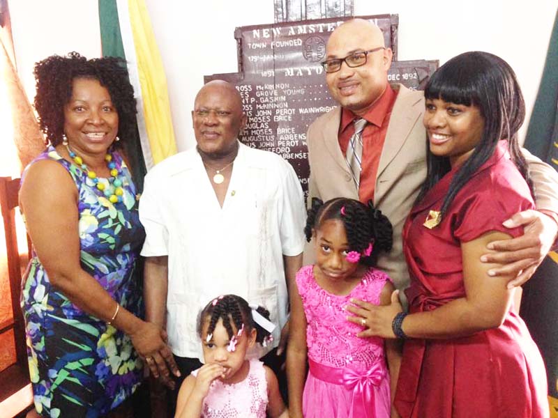 New Amsterdam mayor Kirt Wynter with his wife and outgoing   Mayor Claude Henry