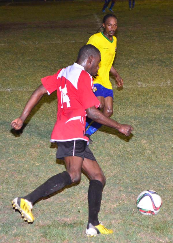 This Buxton United player tries to get into the Pele area in their clash on Wednesday night at the GFC ground.