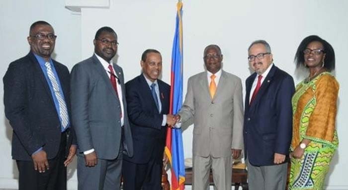 From left: Mr Dereck Springer, Director PANCAP Coordinating Unit; Dr. Yafflo Ouattara, UNAIDS Country Coordinator, Haiti; Dr. Edward Greene, UN Special Envoy for HIV in the Caribbean; His Excellency Jocelerme Privert, President, Haiti; Dr. Cesar Nunez, UNAIDS Regional Director, Latin America and Caribbean; Dr. Francoise Ndayishimiye, Human Rights and Senior Gender Advisor, UNAIDS, Haiti.