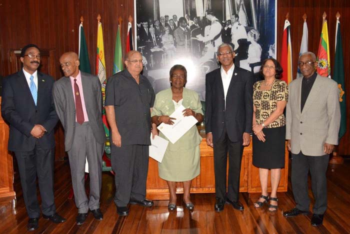 The Committee, with Minister of Legal Affairs Basil Williams and President David Granger.