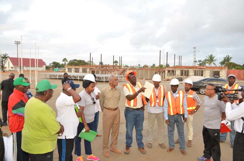 President David Granger makes a point to Minister within the Ministry of Public Infrastructure, Ms. Annette Ferguson, during the visit to the D’Urban Park Development Project site earlier this morning.