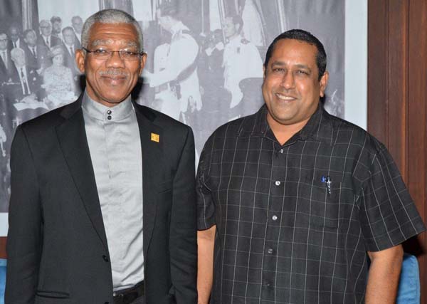 President David Granger and Chief Executive Officer of the Iwokrama International Centre for Rainforest Conservation and Development, Dr. Dane Gobin at the Ministry of the Presidency yesterday.