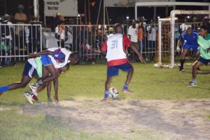 Players from Bent Street and Cross Street battle for possession of the ball in their encounter on Sunday.