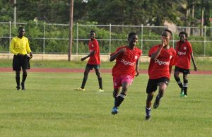 Chris Nelson (right) celebrates after scoring the opening goal.