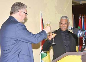 EU Ambassador, Jernej Videtiè enjoys a light moment with President David Granger 