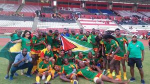 Guyana Rugby players and a few supports celebrate following their victory. (Photo: Noelle Anyika Smith)