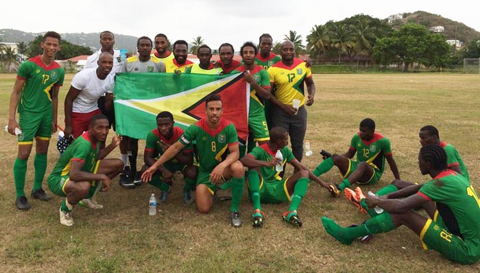 Guyana’s Golden Jaguars with some supporters following their 7-0 win over the USVI yesterday.