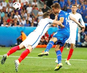 Iceland's Kari Arnason in action versus England in their EURO 2016 - Round of 16 clash at the Stade de Nice. (REUTERS/MICHAEL DALDERLIVEPIC)