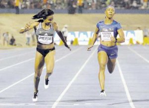 Jamaica’s Shelly-Ann Fraser- Pryce (right) wins the women’s 100m race in a season-best 11.09 seconds ahead of American Barbara Pierre.  (Photo: Bryan Cummings)