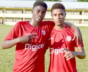 Christianburg / Wismar goalscorers Brian Johnson (left) and Shaquille Campbell pose for a photo op yesterday.