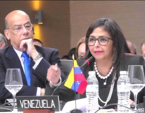  Sir Ronald Sanders (left) and Delcy Rodríguez, Venezuela’s Foreign Minister, at the OAS General Assembly