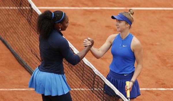 Serena Williams of the U.S. (L) shakes hands with Elina Svitolina of Ukraine at the French Open at Roland Garros, Paris, France. (REUTERS/GONZALO FUENTES)