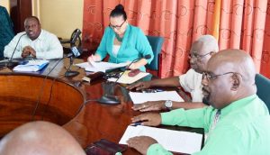 Defending: From left- Town Clerk Royston King; Mayor Patricia Chase-Green; and councillors Oscar Clarke and Junior Garrett.