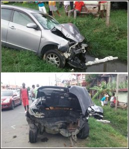 (Above) The Nissan Bluebird where it finally came to a stop; in the trench. (Below)The back of the vehicle that was smashed into.