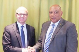 Norway’s Minister of Climate and Environment, Vidar Helgesen (left) with Guyana’s Minister of Natural Resources, Raphael Trotman.