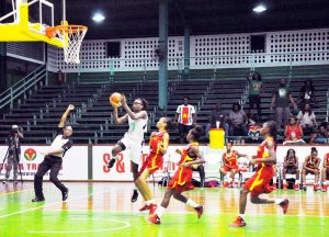 Eventual MVP, Bahamas’ Tanea beats the Surinamese defense on her way to the basketball for an easy lay-up Saturday night at the Cliff Anderson Sports Hall.