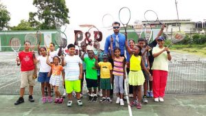 Youngsters participating in the P&P Insurance sponsored Tennis camp along with Vikash Panday during the opening.