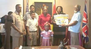 Representatives of the Schools pose with GUYOIL Managing Director Reggie Bhagwandin and ‘B’ Division Traffic Chief – Boodnarine Persaud.