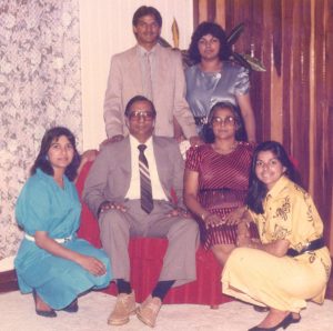 With her siblings and parents back in the day