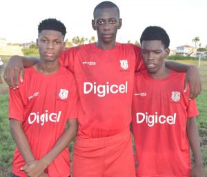 From left, Jaleel Fraser, Joshua Wilson and Orin Glen pose for a photo op yesterday.