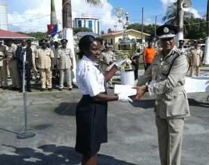 Division Leader of overall winners, Immigration collects the trophy from Commissioner Seelall Persaud