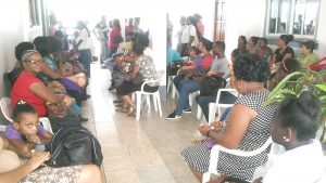 Persons waiting at the Ministry of Public Health for their dose of the Yellow Fever vaccine.