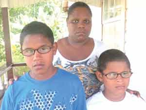 Ronella Jarvis and her two sons, Roell (left) and Rellon