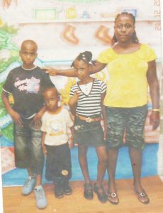 Andel Daniels, Left, with his siblings and mother  before trhe woman disappeared three years ago.