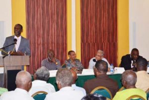 Glenroy Cumberbatch, Registrar of CXC making remarks at the launch of accreditation to award CVQs at the Pegasus Hotel.