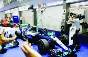 Mercedes’ Nico Rosberg of Germany  celebrates winning the Singapore Grand Prix  at the Marina Bay. (REUTERS/Edgar Su)