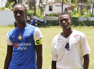 Ozelle Jacobs -Mahaica Determinators (right) and Buxton United’s Kobe Durant.