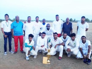 The winning Rose Hall Estate Cricket Club team with their hardware after the presentation.