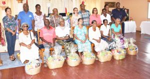 : The senior citizens pose with RHTY&SC and Town Council representatives. 